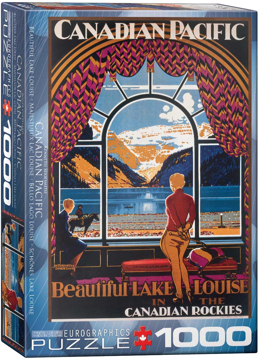 Chateau Lake Louise appears beside the lake in its mountain setting, with the hotel's windows turned toward the water and the surrounding peaks.
