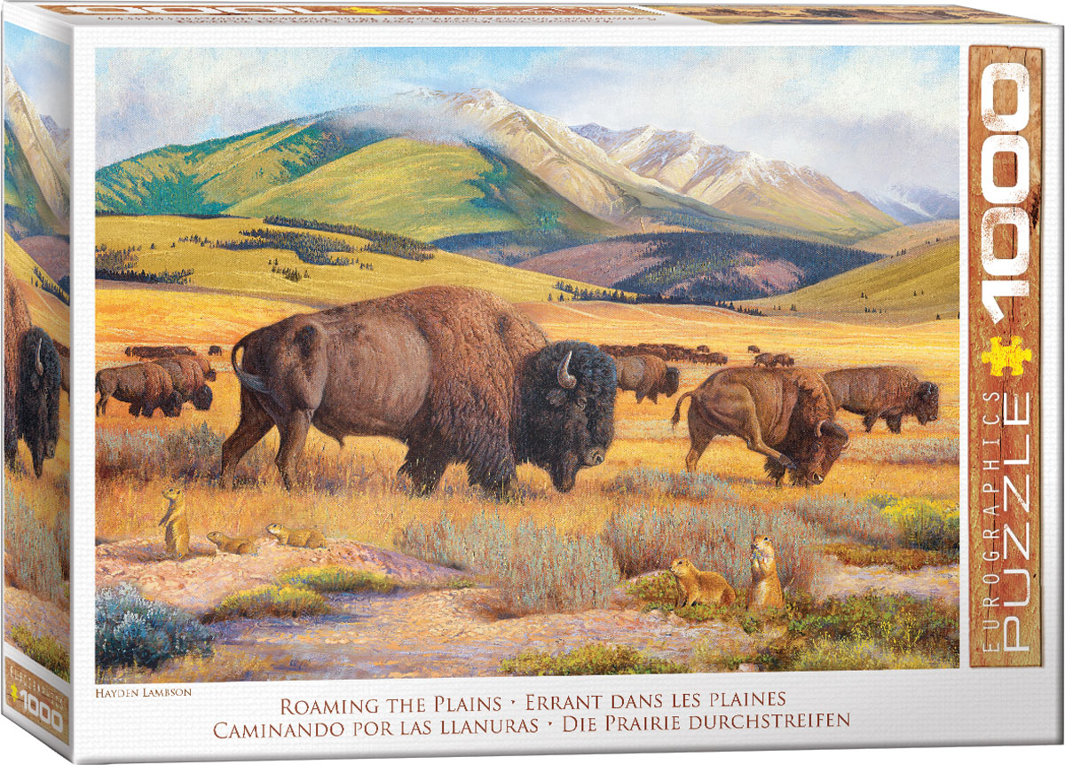 Bison move across an expansive prairie beneath a bright sky, while prairie dogs watch from the foreground. Rolling hills lead toward snow-covered mountains in the distance.
