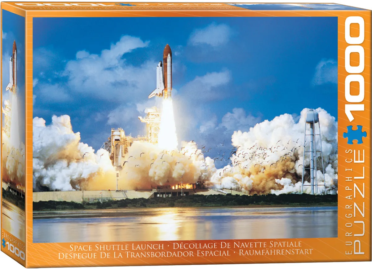 The artwork depicts Atlantis taking off at Cape Canaveral in a space-shuttle launch scene.