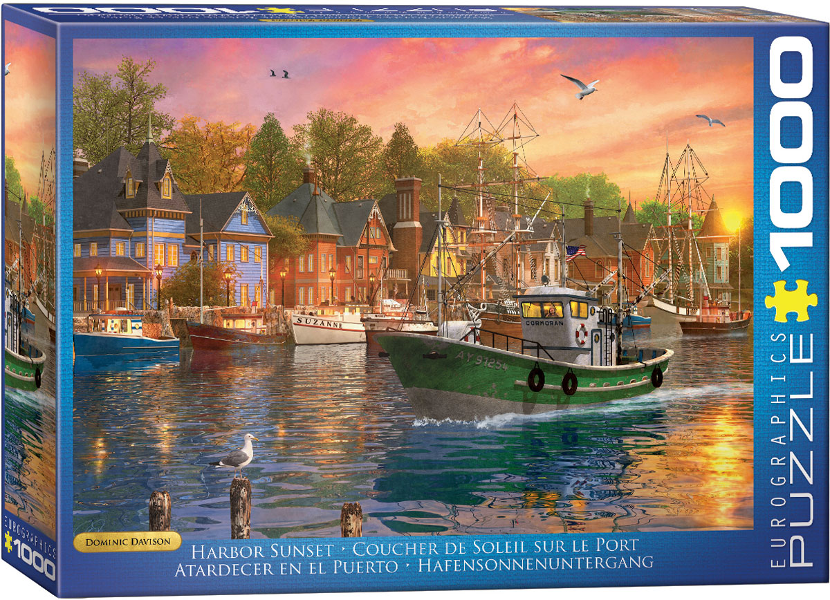 Sunlight glistens across harbor water as daylight fades, framing a waterfront sunset scene.