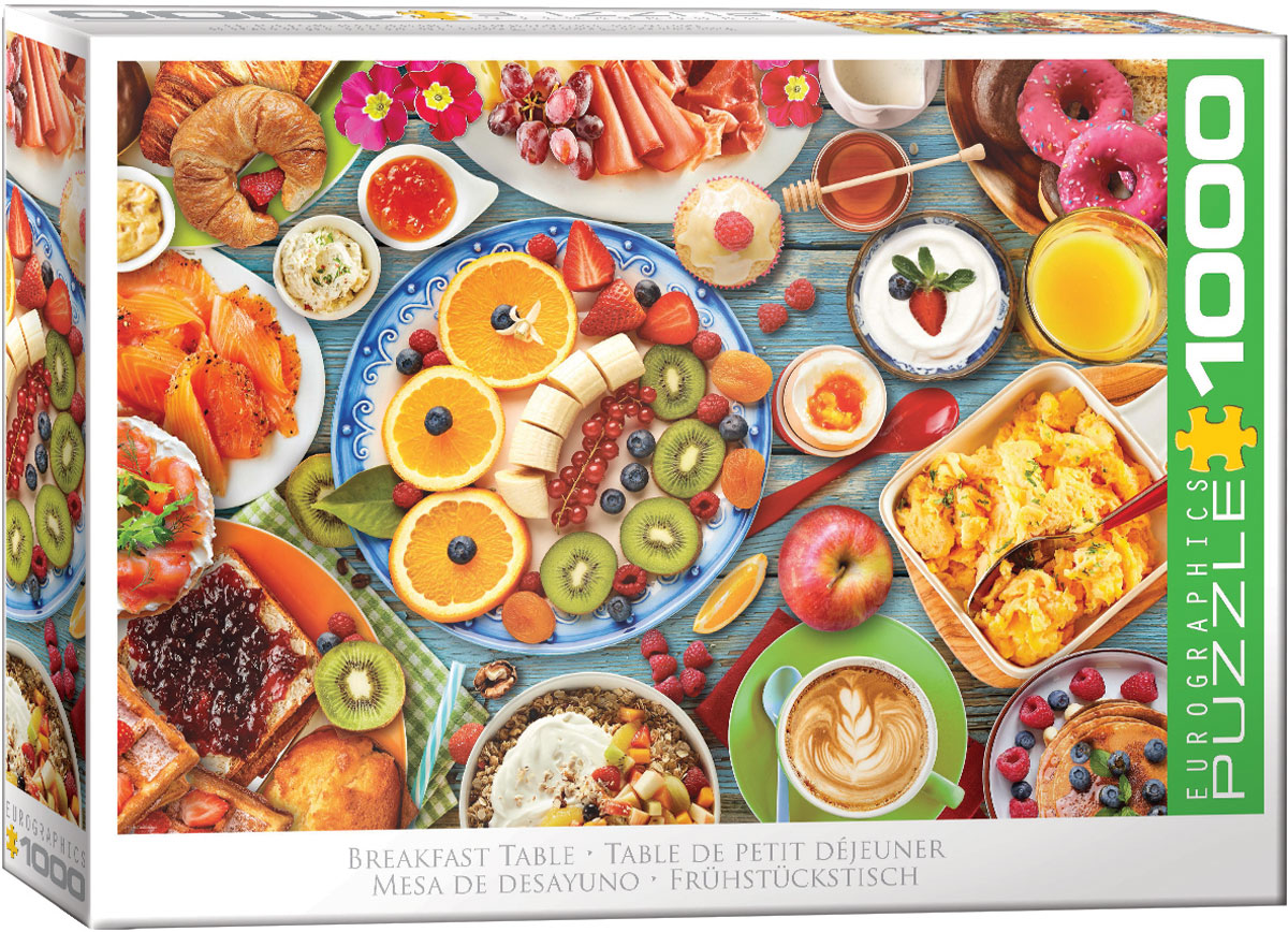 A breakfast table featuring fruits, breads, eggs, yogurt, and a warm cup of coffee or a cold glass of juice.